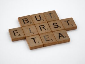 Scrabble words that say But First Tea