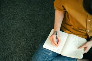 girl writing notes 