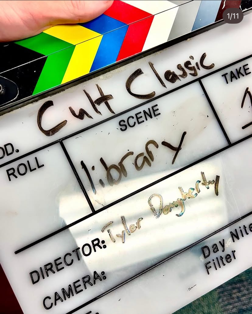 Clap Board with Cult Classic written for title and Tyler for Director