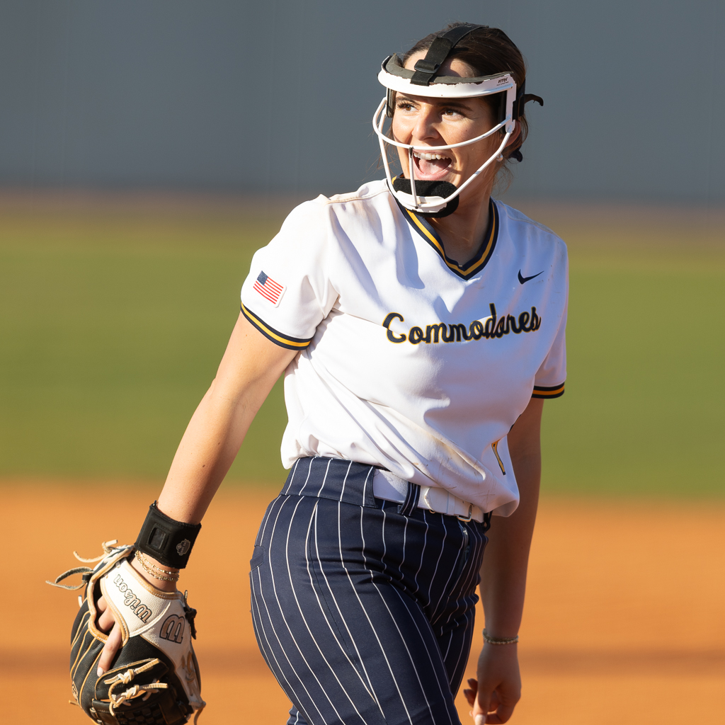 Madison Laiche cheering after striking out a batter during Gulf Coast State Commodores softball game