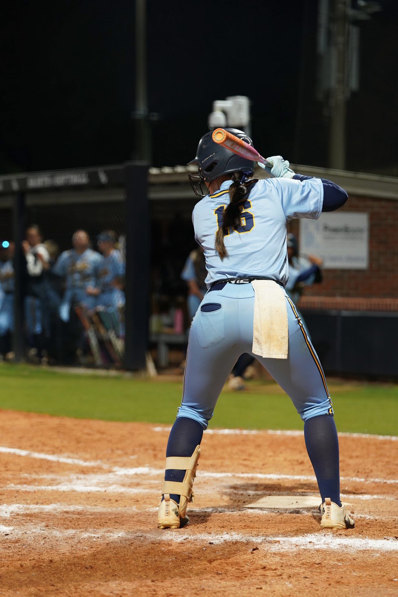 Ella Grace Kelley standing in the batter’s box preparing to swing during Gulf Coast State Commodores softball game vs LBW