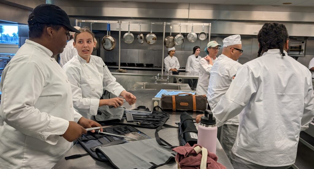 Culinary students prepping the kitchen to make sushi